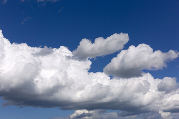 Obraz premium White and Grey clouds on blue sky background.