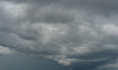 Cumulonimbus cloud formations on tropical sky , Nimbus moving , Abstract background from natural phenomenon and gray clouds hunk , Thailand