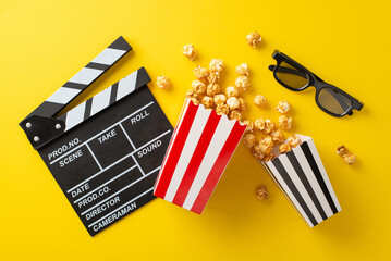 Cinematic Delights Design. Top view perspective of striped boxes of popcorn, 3D spectacles, and clapperboard on yellow surface, perfect for promotional content - obrazy, fototapety, plakaty