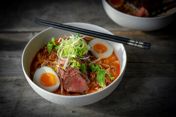 Pan Fried Beef Laska, Jammy Egg, Asian Herbs