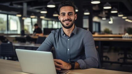 Portrait of a male social media manager at a successful e-commerce company monitoring online communities