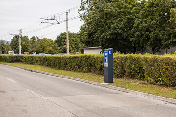 Parking machine mounted on a strange location, without proper access and platform for the payee. Greedy Ljubljana mayor putting pay machines everywhere.