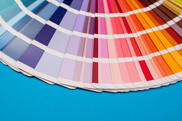 Catalog of paper color palette isolated on blue background