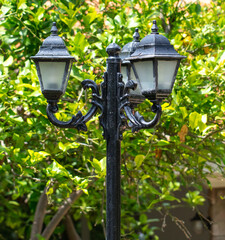 Pillar with a lantern in the park