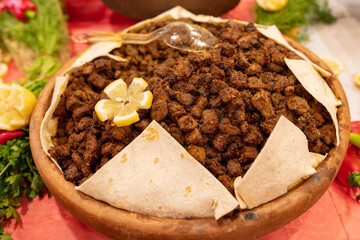 A dish of liver on a showcase in a restaurant