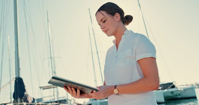 Yacht, tablet and sailing with woman on pier for cruise, management and travel. Boat crew, network and digital with person and search in ship harbor for summer adventure, vacation and technology