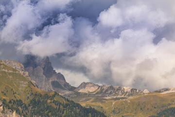 Landscape in the Dolomite Mountains, Italy, in summer, with dramatic storm clouds