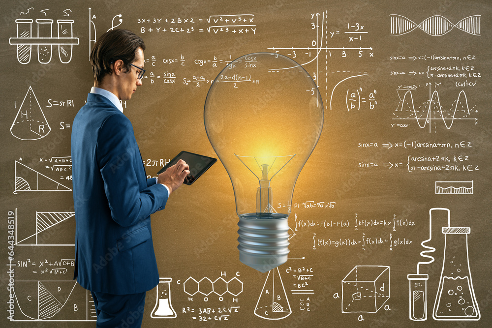 Aufkleber attractive thoughtful young european businessman using tablet with glowing light bulb on chalkboard 