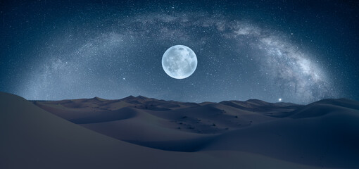 Amazing Milky Way over the sand dunes of Sahara Desert with full moon - Sahara, Morocco 
