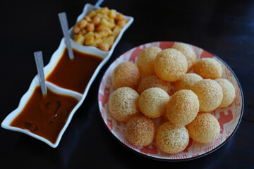 Pani puri is popular Indian street food with crispy and tasty.