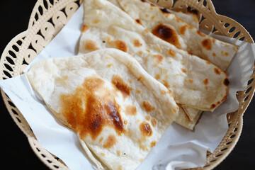 Tandoori butter Naan is a traditional soft Indian flatbread made in the tandoori oven.