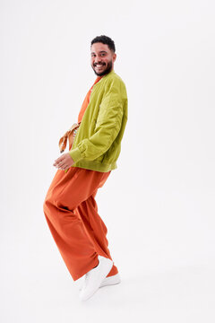 Happy Man Dancing Against White Background