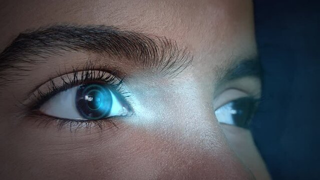 High-tech futuristic eye with light rays