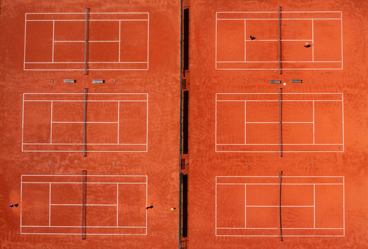 Drone view of rows of tennis courts