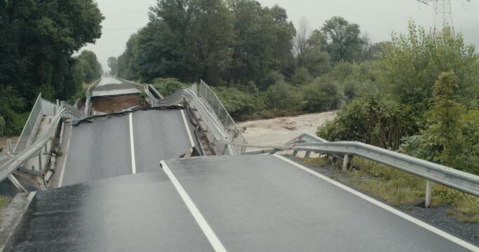 Collapsed bridge catastrophe severe floods river water road damage
