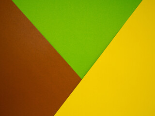 Brown, green, and yellow paper color for the background. Top view