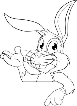 An Easter bunny rabbit cartoon character peeking around a sign