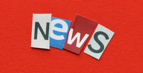 NEWS a word composed of letters cut out of a newspaper.