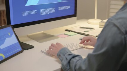 Asia people expert man tech talent night working late on predict sales insight SEO graph chart AI smart plan visual big data science report center BI tools screen. Office worker asian analyst job.