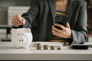 Business women think of the concept of saving money.