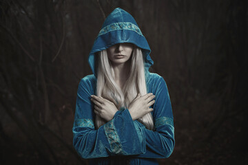 Dark elfin woman in winter woods - 644386123