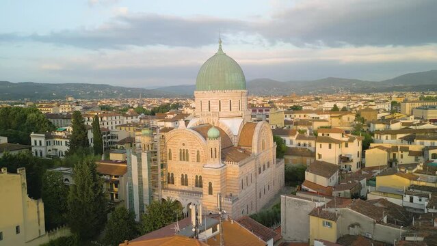The Great synagogue of Florenze illuminated by the setting sun. Drone dolley shot
