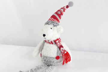 Polar bear stuffed animal with Christmas hat and scarf