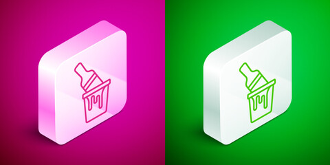 Isometric line Paint bucket with brush icon isolated on pink and green background. Silver square button. Vector