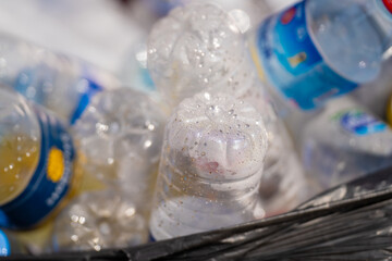 Fototapeta na wymiar Plastic bottles in the garbage bag.