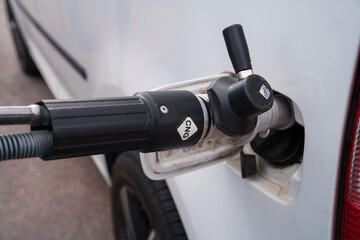 Natural gas refilling close up in CNG filling station. Finland.