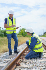 Team of railway maintenance engineer inspecting a railway or track, railway maintenance workers checking an installation properly.