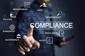 Businessman pointing on gear or cog to working with compliance driving law and regulation standards to international standard requirement certified of country procedure products import and export