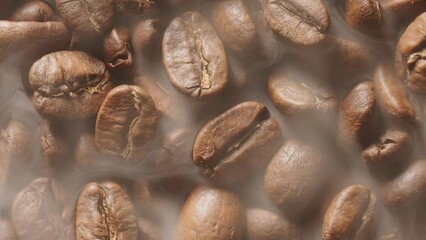 Coffee beans are roasted with little roasted smoke, the camera close up slowly follows the numerous coffee beans.