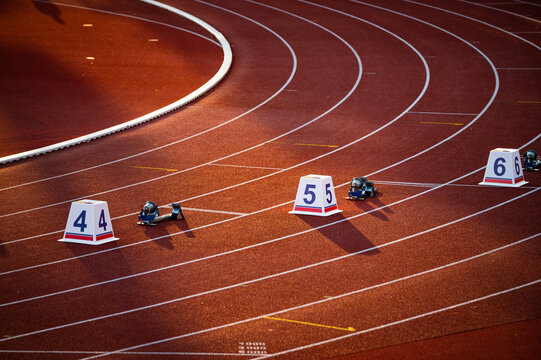 Red Track with Precise White Lines and Sequential Numbers: A Visual Representation of Athletic Preparation and Precision - Track and Field Illustration Photo for Worlds in Budapest and Games in Paris