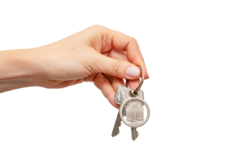 Woman holding keys with house shaped keychain
