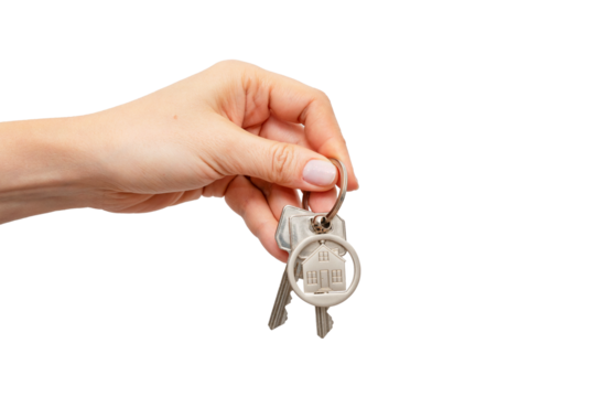 Woman holding keys with house shaped keychain