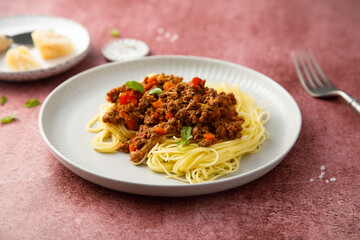 Traditional spaghetti Bolognese with fresh basil