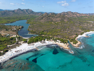 Drone view of Cala Ginepro and Cala Liberotto beachs, with the Sa Curcurica pond, Orosei, Sardinia, Italy