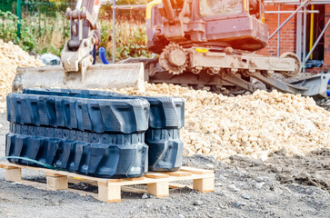 New rubber track for mini digger excavator on building site