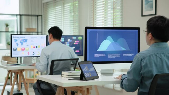 Asia people expert man tech talent working on project predict sales insight SEO graph chart AI smart plan visual big data science report center BI smart tools screen. Office worker asian analyst job.