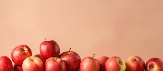 Red apples on a isolated pastel background Copy space fresh