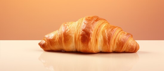 Tasty croissant against isolated pastel background Copy space