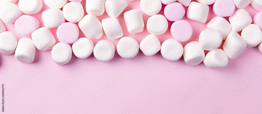Poster marshmallows on a isolated pastel background copy space