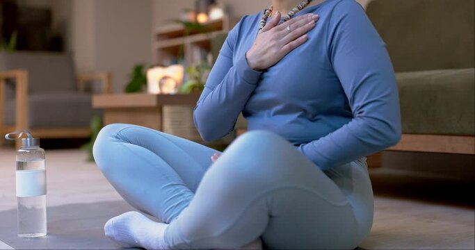 Yoga meditation, body and person touch chest, heartbeat and stress relief for wellness, breathing exercise or holistic energy. Pilates, spiritual healing and yogi mindfulness, peace or active workout
