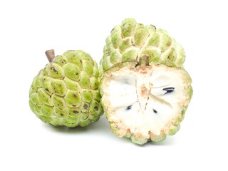 Fresh organic custard apples placed on a white background.