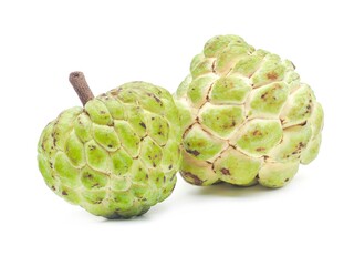 Fresh organic custard apples placed on a white background.