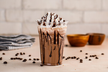 Mocha creamy Delight with ice cream and chocolate chip and coffee beans served in glass isolated on...