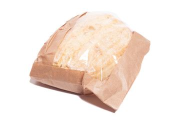 White bread in a paper bag isolated on white background.