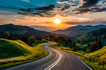 A  winding road going into the distance by the setting sun, mountains on the horizon, green hills and forest on the sides - Powered by Adobe