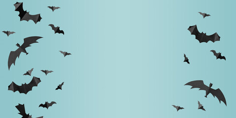 Halloween concept. Black papercraft flying bats on blue. Flat lay and copy space.